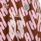Adidas Adicolor Polo Knit in Preloved Brown/True Pink