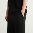 New Balance Men's Athletics French Terry Pant in Black