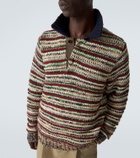 Sacai Striped cotton-blend polo sweater