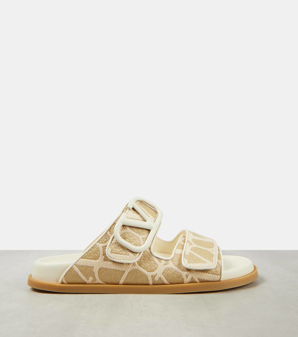 Vlogo embellished leather-trimmed raffia slides tan