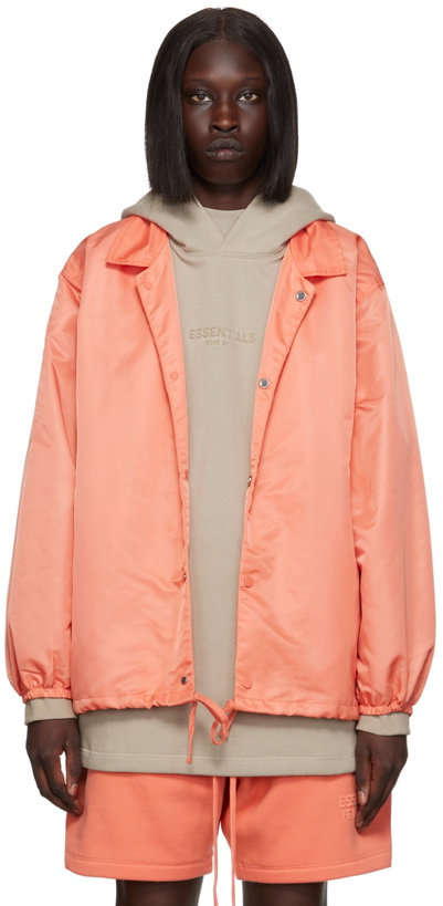 Photo: Fear of God ESSENTIALS Pink Nylon Jacket