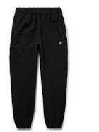 Nike - Solo Swoosh Tapered Logo-Embroidered Cotton-Blend Jersey Sweatpants - Black