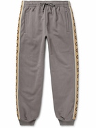 GUCCI - Tapered Logo-Jacquard Webbing-Trimmed Loopback Cotton-Jersey Sweatpants - Gray