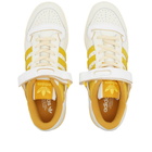 Adidas Forum 84 Low Sneakers in White/Hazy Yellow