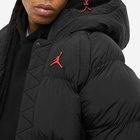 Air Jordan Men's Essential Puffa Jacket in Black/Fire Red