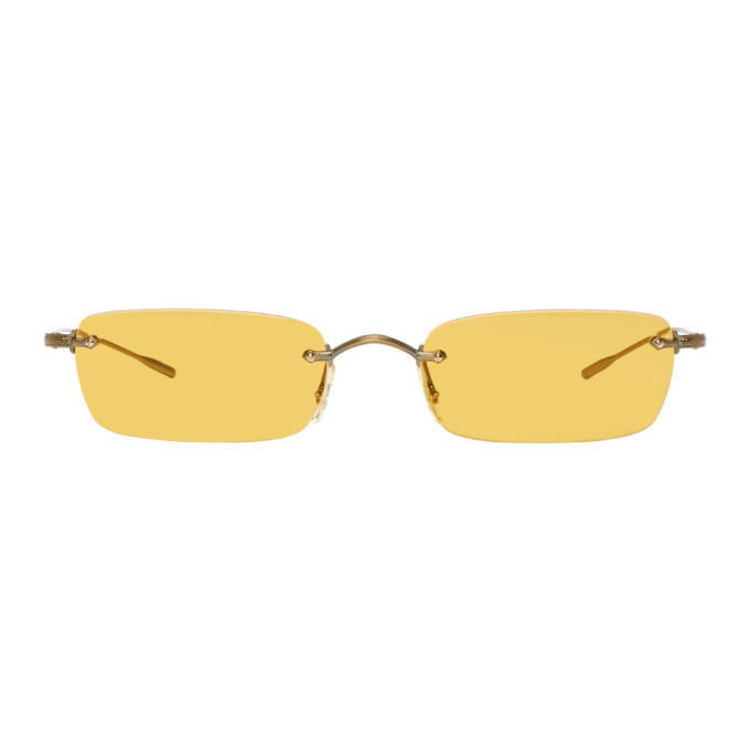 Photo: Oliver Peoples Gold and Yellow Daveigh Sunglasses