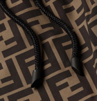 Fendi - Tapered Logo-Print Shell Drawstring Trousers - Brown