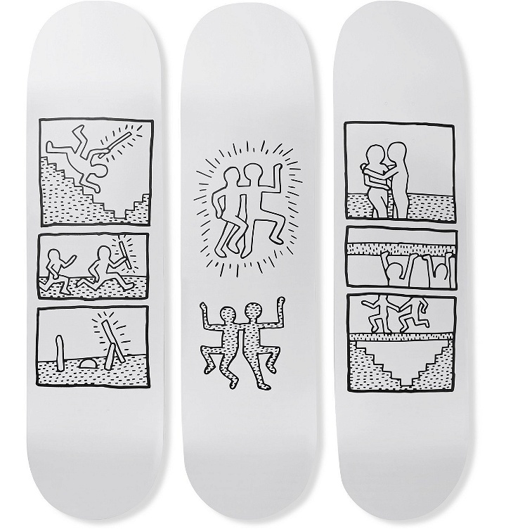 Photo: THE SKATEROOM - Keith Haring Set of Three Printed Wooden Skateboards - White
