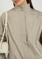 Alaïa High-neck Woven Windbreaker Jacket Beige