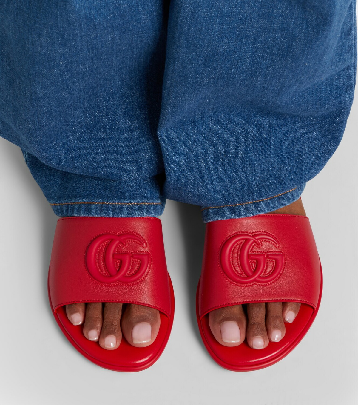 Gucci Double G leather slides