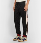 Gucci - Tapered Webbing-Trimmed Tech-Jersey Track Pants - Black