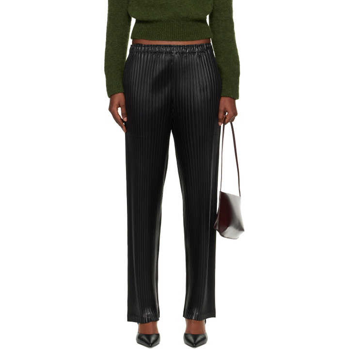 Photo: ISSEY MIYAKE Black Glossed Metal Pleats Trousers
