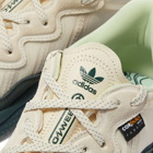Adidas Men's Ozweego Sneakers in Wonder White/Legend Ivy