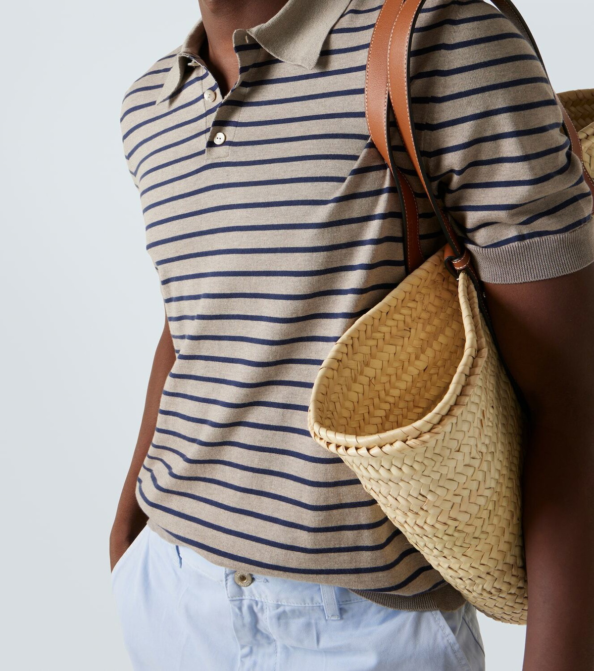 Loewe Knitted striped cotton-blend polo shirt