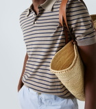 Loewe Knitted striped cotton-blend polo shirt