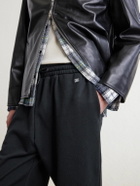 CELINE - Tapered Logo-Embroidered Cotton Sweatpants - Black