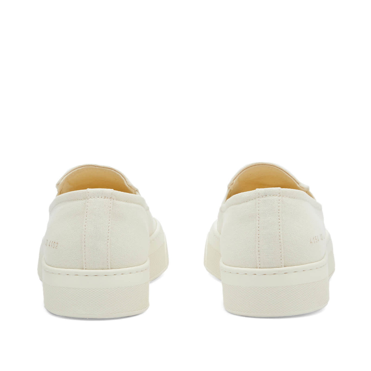 Woman by Common Projects Women's Slip on Canvas Sneakers in Off