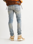 AMIRI - Thrasher Skinny-Fit Panelled Distressed Jeans - Blue