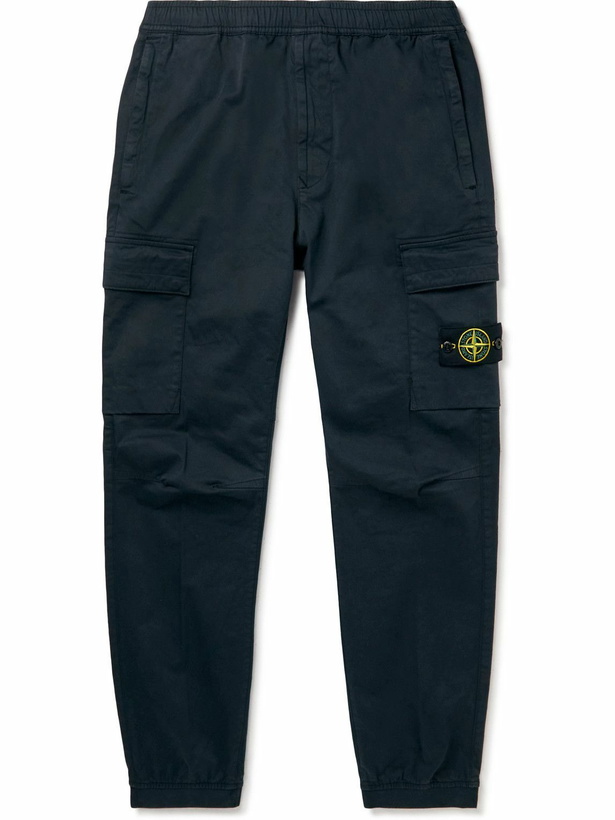 Photo: Stone Island - Tapered Logo-Appliquéd Garment-Dyed Cotton-Blend Cargo Trousers - Blue