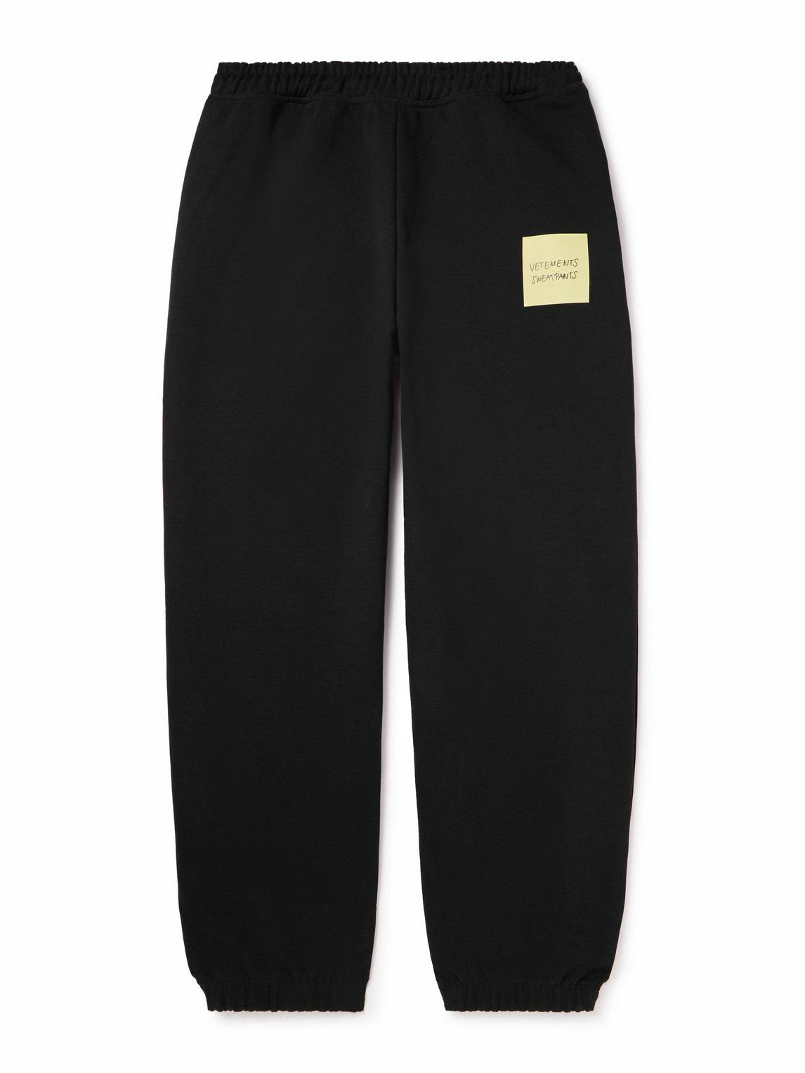 VETEMENTS - Tapered Logo-Print Cotton-Blend Jersey Sweatpants - Black ...