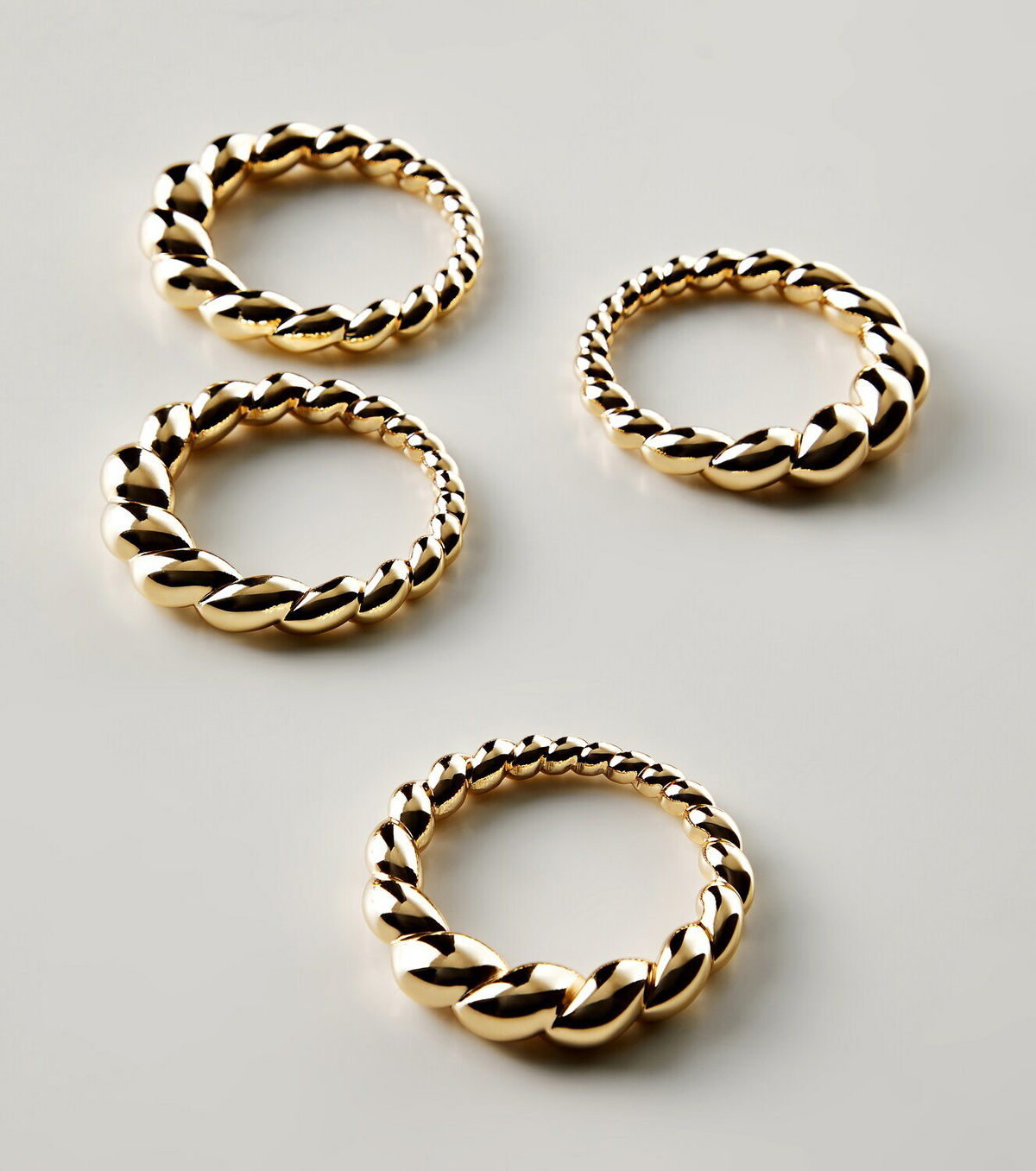 L'Objet x Jessica McCormack set of 4 knotted metal napkin rings