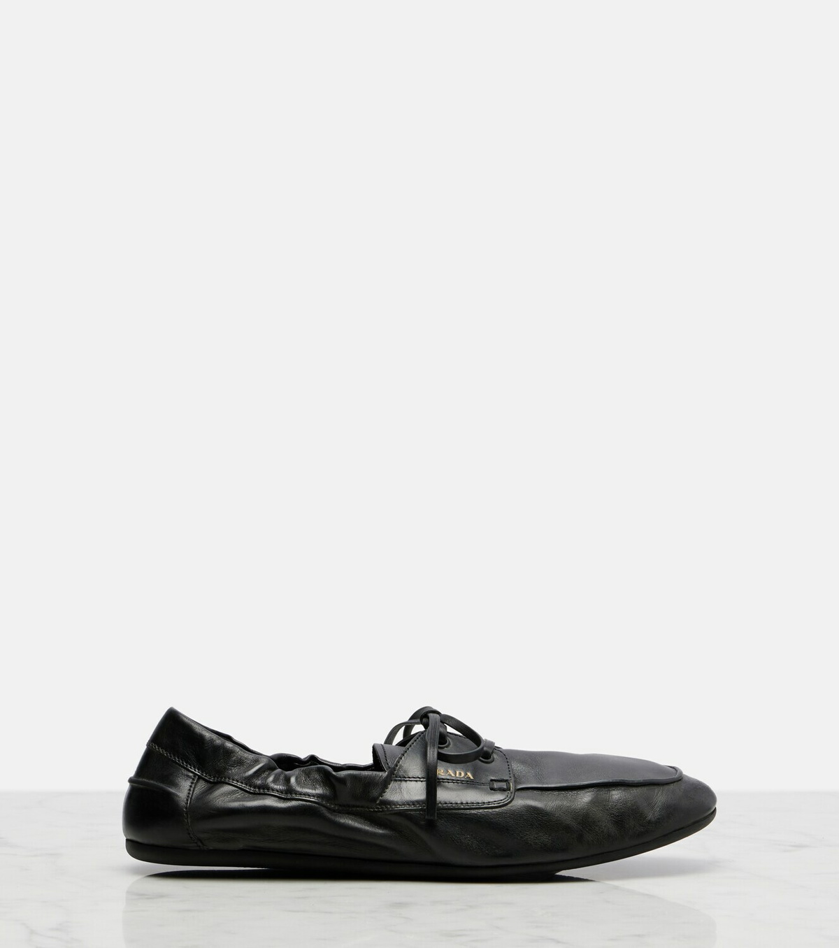 Prada Shuffle leather boat shoes