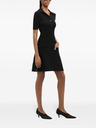 Courrèges Black Buckled Wool Mini Skirt