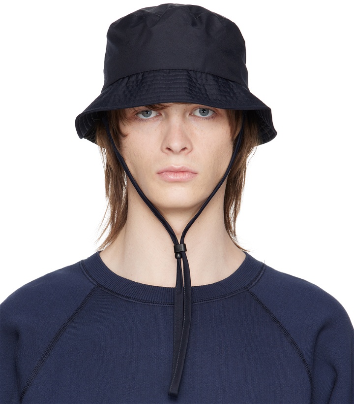 Photo: NORSE PROJECTS Navy Chin Strap Bucket Hat