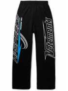 VETEMENTS - Wide-Leg Logo-Print Cotton-Jersey Sweatpants - Black