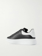 McQueen - Exaggerated-Sole Studded Leather Sneakers - Black