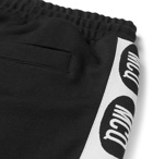 McQ Alexander McQueen - Tapered Logo-Trimmed Loopback Cotton-Jersey Sweatpants - Men - Black