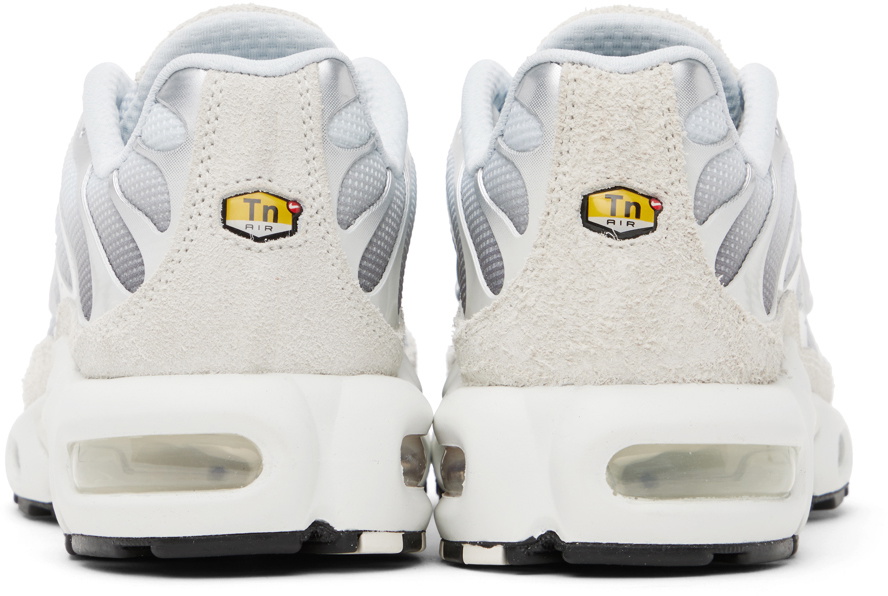 gray and white nike air