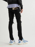 AMIRI - Skinny-Fit Leather-Appliquéd Panelled Distressed Jeans - Black