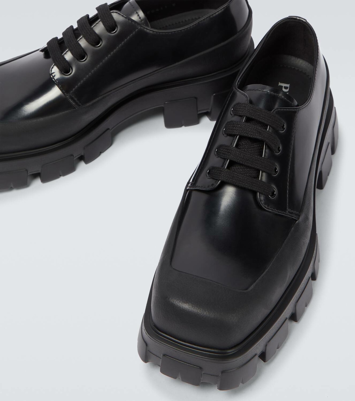 Prada Paneled leather Derby shoes