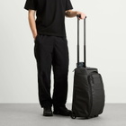 Db Journey Hugger Roller Bag Carry-On - 40L in Black Out 