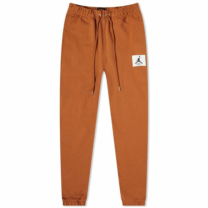 Photo: Air Jordan Men's Statement Fleece Pant in Desert Bronze