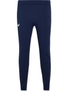 Castore - Slim-Fit Tapered Logo-Print Stretch-Shell Trousers - Blue