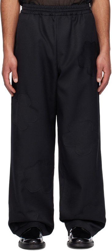 Photo: FORMA Black Flower Patch Oversize Trousers