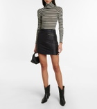 Khaite Kita ribbed-knit silk turtleneck sweater