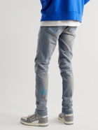 AMIRI - Skinny-Fit Distressed Embroidered Jeans - Blue
