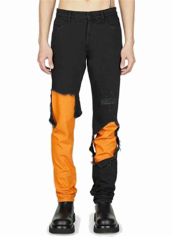 Photo: Raf Simons - Destroyed Double Jeans in Orange