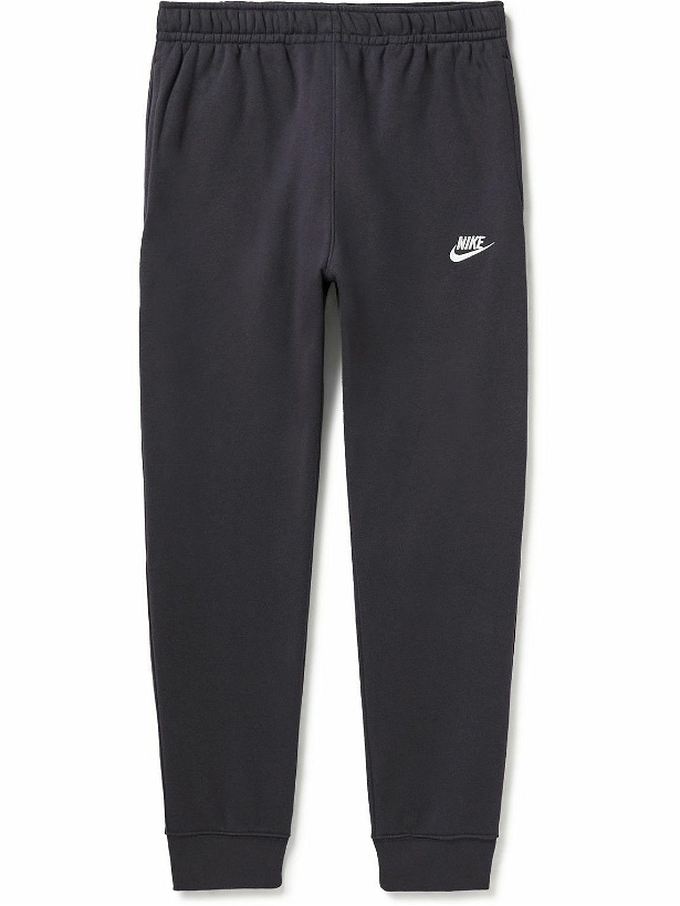 Photo: Nike - Tapered Logo Embroidered Cotton-Blend Jersey Sweatpants - Blue