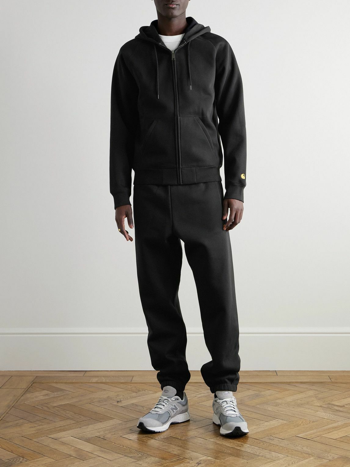 Carhartt WIP - Chase Tapered Logo-Embroidered Cotton-Blend Jersey Sweatpants - Black