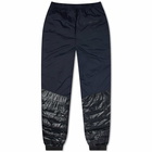 The North Face Men's x Undercover 50/50 Down Pant in Tnf Black/Aviator Navy