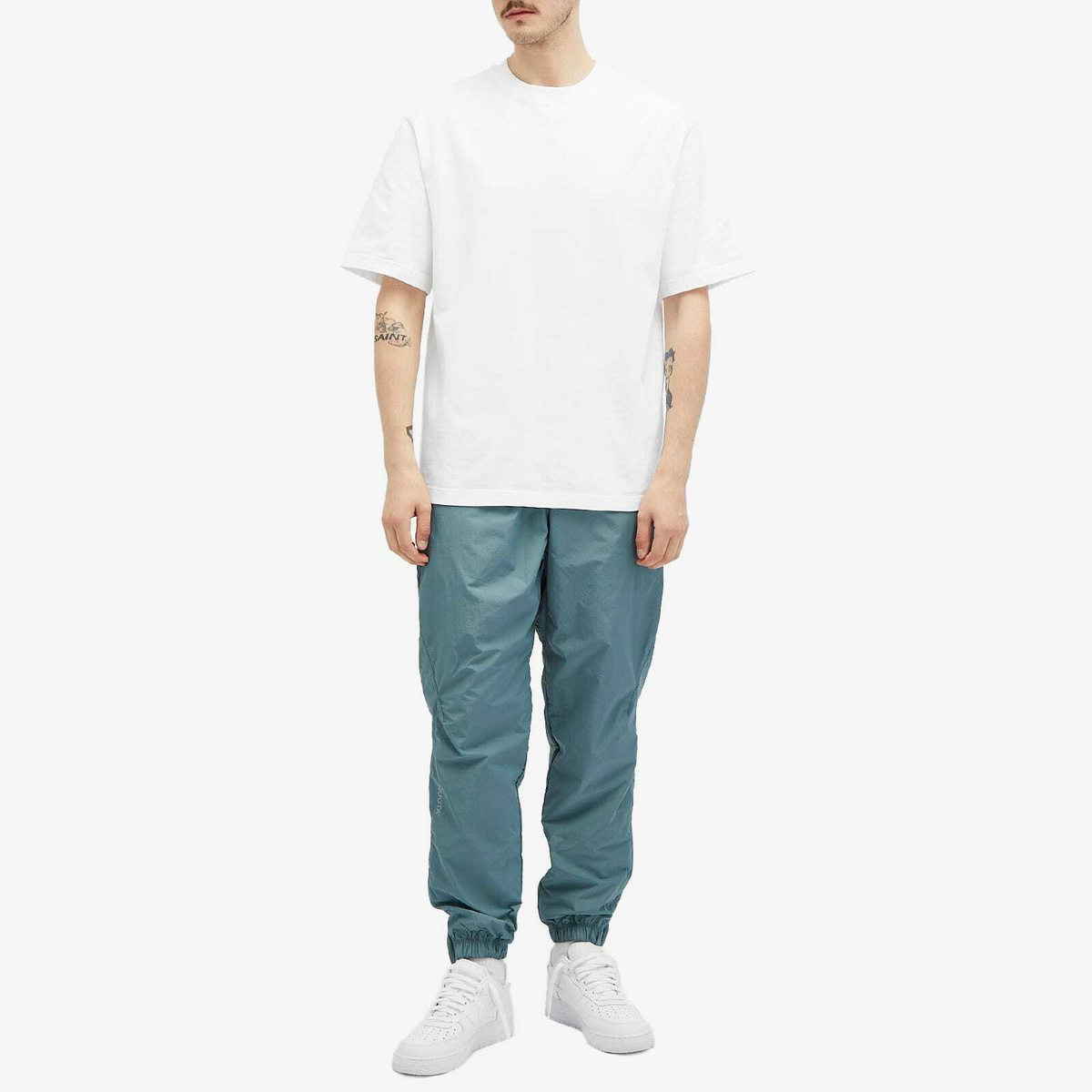 Nike Nocta Cardinal Stock Woven Track Pant in Mineral Slate Nike Nocta Cardinal Stock Woven Track Pant in Mineral Slate
