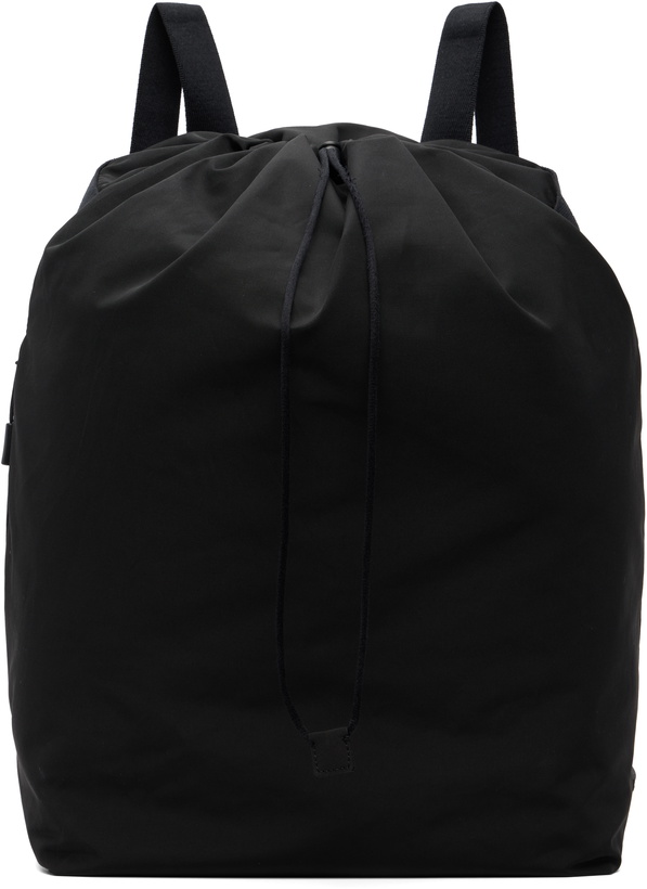 Photo: The Row Black Dima Drawstring Small Backpack