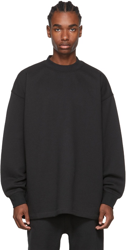 Photo: Fear of God ESSENTIALS Black Relaxed Sweatshirt