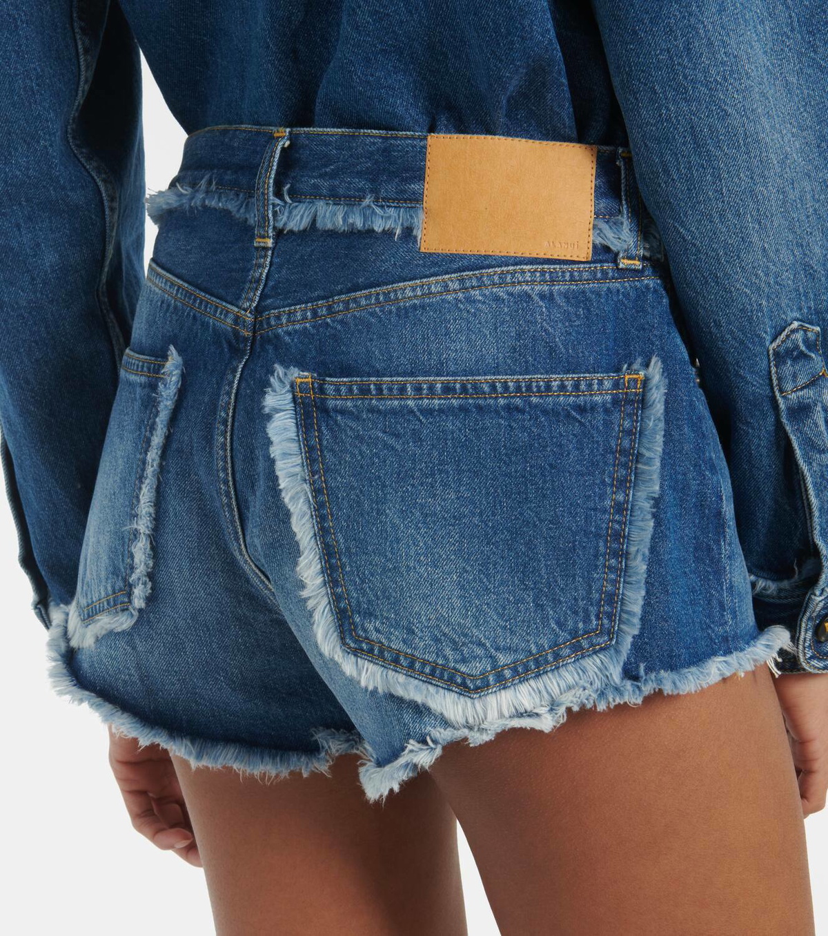 Alanui Fringed denim shorts