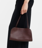 The Row Peggy Medium leather clutch