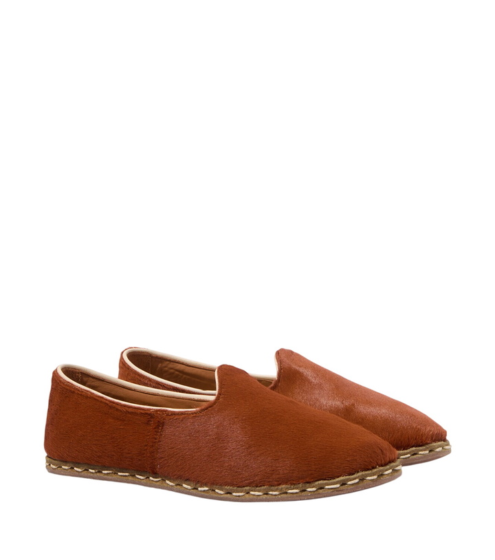 Photo: Sabah Calf hair slip-on shoes